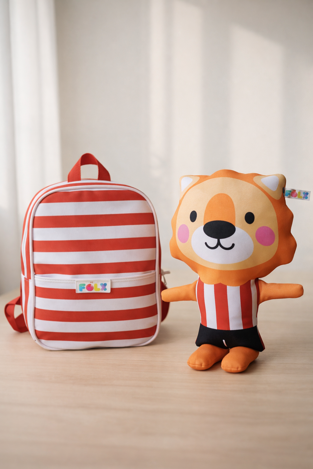Mochila Rayas + León (Pack)